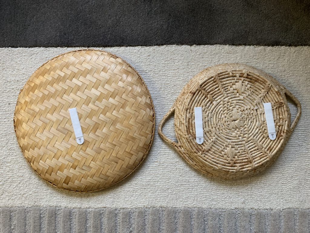 Reverse side of two baskets with 3m command strips attached