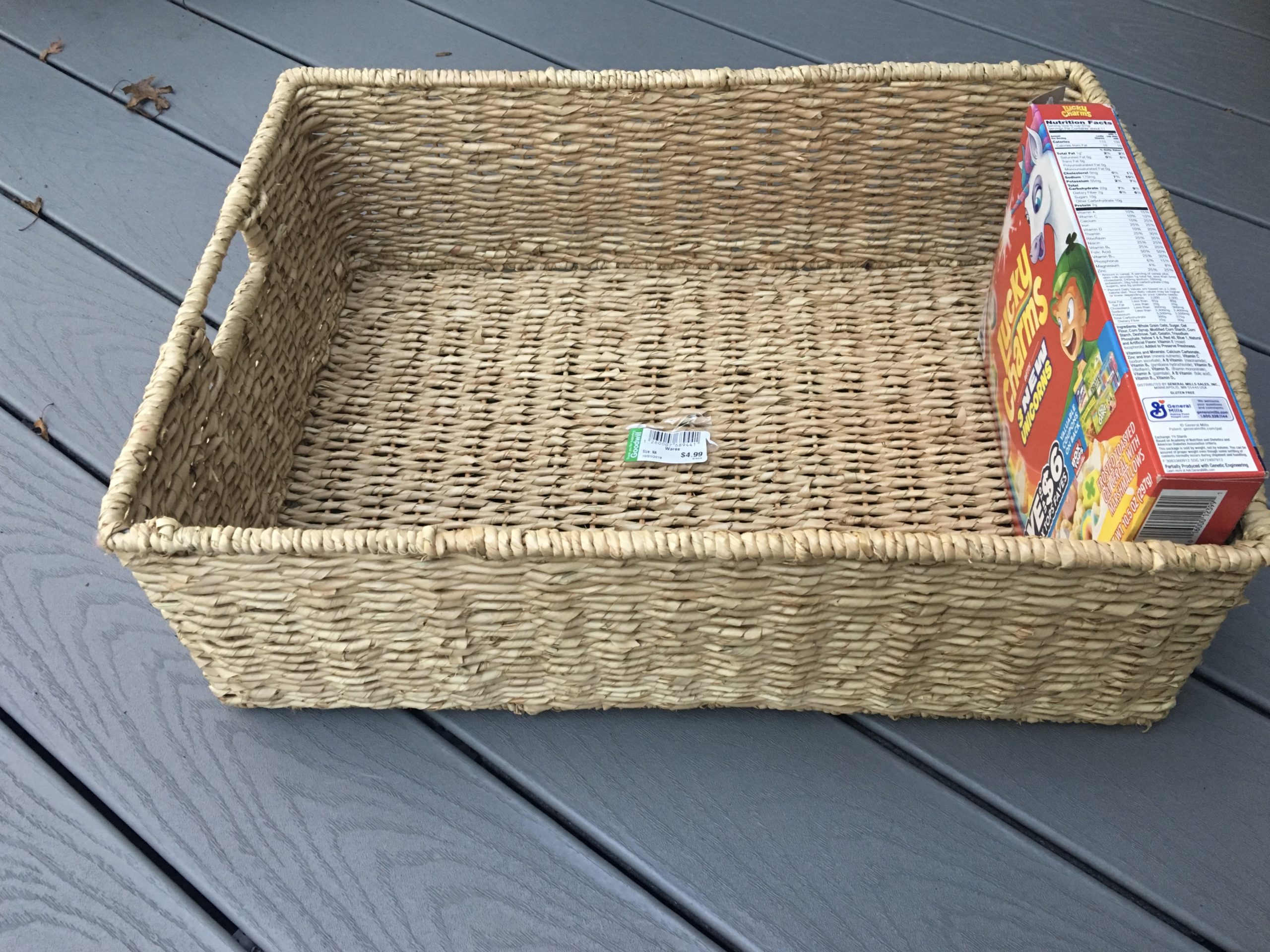 large wicker above refrigerator basket with cereal box