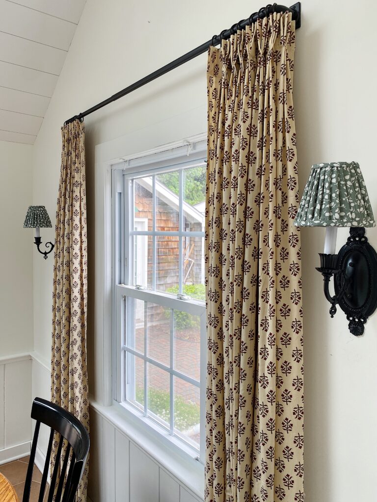 print curtains and lampshades in dining nook